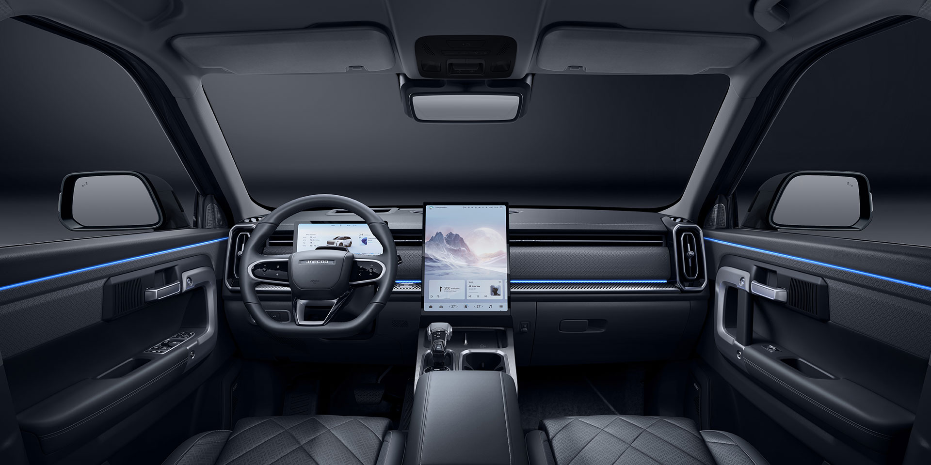 Interior view of the new premium off-road SUV, showcasing a modern dashboard with a digital screen, steering wheel, center console with another touchscreen display, quilted seats, and ambient blue lighting accents designed for JAECOO premium off-road performance.